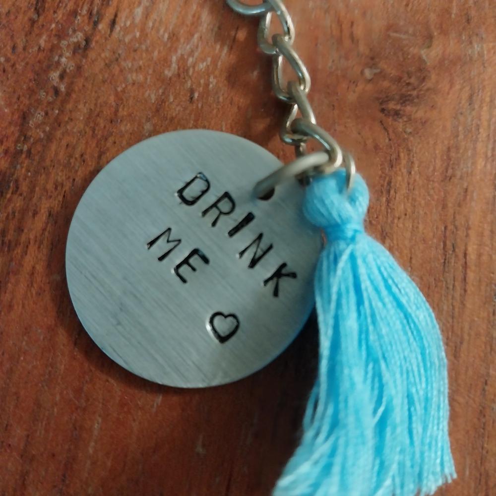 Silver Charm Keychain with Blue Tassel